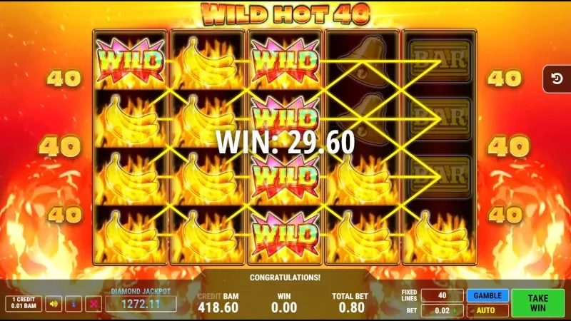 Partida de Wild Hot 40 con símbolos wild, plátanos y líneas de pago amarillas resaltadas sobre fondo de fuego